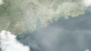 Dünya uzaydan Hong Kong 'a, Kowloon Park' taki Çin 'e yakınlaşacak. Arkasından bulutlar ve atmosferden uzaya zum geliyor. Uydu görüntüsü. Seyahat girişi