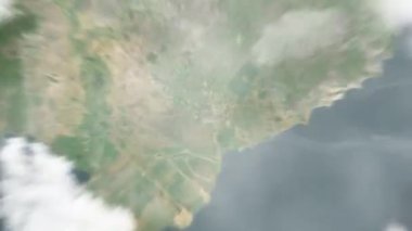 Dünya uzaydan Ho Chi Minh City, Vietnam 'a yakınlaşacak. Arkasından bulutlar ve atmosferden uzaya zum geliyor. Uydu görüntüsü. Seyahat girişi