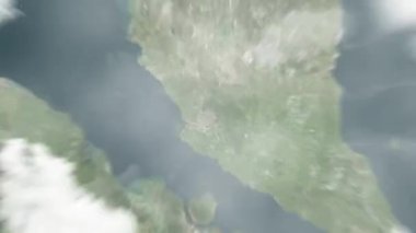 Dünya, Istana Negara 'daki Malezya' nın Kuala Lumpur şehrine uzanıyor. Arkasından bulutlar ve atmosferden uzaya zum geliyor. Uydu görüntüsü. Seyahat girişi