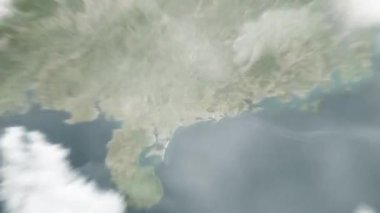Dünya uzaydan Maoming 'e, Çin Merkez Meydanı' na yakınlaşacak. Arkasından bulutlar ve atmosferden uzaya zum geliyor. Uydu görüntüsü. Seyahat girişi