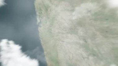 Dünya, Shaniwar Wada 'da, uzaydan Pune, Hindistan' a yakınlaşır. Arkasından bulutlar ve atmosferden uzaya zum geliyor. Uydu görüntüsü. Seyahat girişi