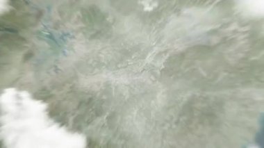 Dünya uzaydan Shangrao 'ya, Citizen Park' taki Çin 'e yakınlaşacak. Arkasından bulutlar ve atmosferden uzaya zum geliyor. Uydu görüntüsü. Seyahat girişi