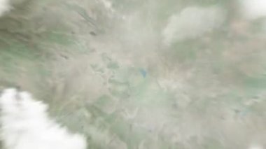 Dünya, Çin Halk Hükümeti 'nde uzaydan Zhumadian' a yakınlaşır. Arkasından bulutlar ve atmosferden uzaya zum geliyor. Uydu görüntüsü. Seyahat girişi