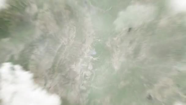 宇宙から中国のセンチュリープラザに地球がズームインします 雲と大気を通して宇宙にズームアウトする サテライトビュー トラベルイントロ — ストック動画