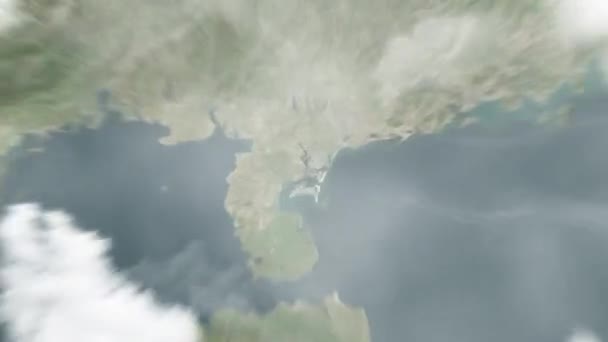 地球は宇宙から中国のZhanjiang 人民会議にズームインします 雲と大気を通して宇宙にズームアウトする サテライトビュー トラベルイントロ — ストック動画
