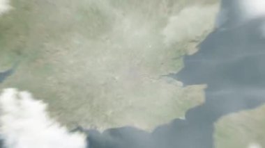Dünya, Britanya Müzesi 'ndeki uzaydan Londra' ya yakınlaşacak. Arkasından bulutlar ve atmosferden uzaya zum geliyor. Uydu görüntüsü. Seyahat girişi
