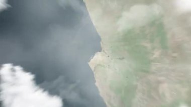 Dünya uzaydan Luanda 'ya, Angola' dan Fortaleza de Sao Miguel 'e yakınlaşır. Arkasından bulutlar ve atmosferden uzaya zum geliyor. Uydu görüntüsü. Seyahat girişi