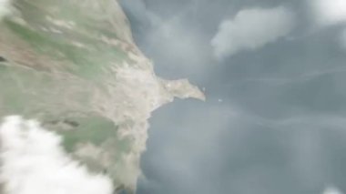 Dünya, Icherisheher 'deki Azerbaycan' dan Bakü 'ye yakınlaşır. Arkasından bulutlar ve atmosferden uzaya zum geliyor. Uydu görüntüsü. Seyahat girişi
