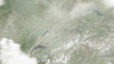 Dünya, Zytglogge 'da, uzaydan Bern, İsviçre' ye yakınlaşır. Arkasından bulutlar ve atmosferden uzaya zum geliyor. Uydu görüntüsü. Seyahat girişi
