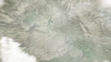 Dünya, Pakistan Anıtı 'nda, uzaydan İslamabad' a zoom yapıyor. Arkasından bulutlar ve atmosferden uzaya zum geliyor. Uydu görüntüsü. Seyahat girişi