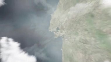 Dünya uzaydan Lizbon 'a, Portekiz' den Praca do Comercio 'ya yakınlaşacak. Arkasından bulutlar ve atmosferden uzaya zum geliyor. Uydu görüntüsü. Seyahat girişi