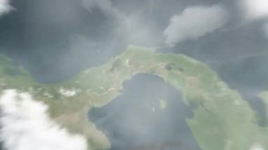 Dünya uzaydan Panama, Panama 'ya yakınlaşacak. Arkasından bulutlar ve atmosferden uzaya zum geliyor. Uydu görüntüsü. Seyahat girişi