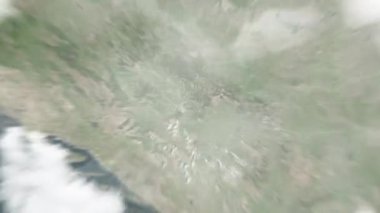 Dünya uzaydan Saraybosna 'ya, Bosna-Hersek' te Bascarsija 'ya yakınlaşacak. Arkasından bulutlar ve atmosferden uzaya zum geliyor. Uydu görüntüsü. Seyahat girişi
