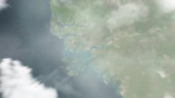 地球从太空放大到几内亚比绍的比绍 然后通过云层和大气变焦进入太空 卫星视图 旅行介绍 — 图库视频影像
