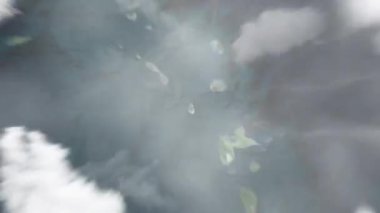Dünya uzaydan Brades, Montserrat 'a zum yapıyor. Arkasından bulutlar ve atmosferden uzaya zum geliyor. Uydu görüntüsü. Seyahat girişi