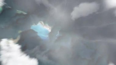 Dünya uzaydan Cockburn Town, Turks ve Caicos Adaları 'na zum yapıyor. Arkasından bulutlar ve atmosferden uzaya zum geliyor. Uydu görüntüsü. Seyahat girişi