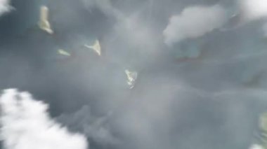 Dünya, uzaydan Mamoudzou, Mayotte 'ye zum yapıyor. Arkasından bulutlar ve atmosferden uzaya zum geliyor. Uydu görüntüsü. Seyahat girişi