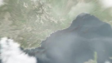 Dünya uzaydan Monako 'ya, Place du Casino' daki Monako 'ya yakınlaşır. Arkasından bulutlar ve atmosferden uzaya zum geliyor. Uydu görüntüsü. Seyahat girişi