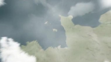 Dünya, Özgürlük Meydanı 'nda, uzaydan Saint Helier, Jersey' e yakınlaşacak. Arkasından bulutlar ve atmosferden uzaya zum geliyor. Uydu görüntüsü. Seyahat girişi
