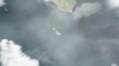 Dünya uzaydan Valletta, Malta 'ya, Triton Çeşmesi' ne zum yapıyor. Arkasından bulutlar ve atmosferden uzaya zum geliyor. Uydu görüntüsü. Seyahat girişi