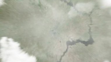 Dünya, uzaydan Krivyy Rih 'e, 95 Kvartal' daki Ukrayna 'ya yakınlaş. Arkasından bulutlar ve atmosferden uzaya zum geliyor. Uydu görüntüsü. Seyahat girişi