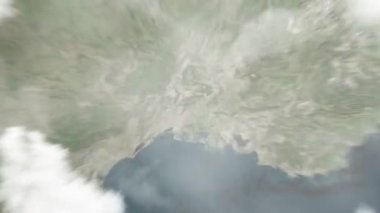 Dünya, Nimes Arenası 'ndaki Nimes, Fransa' ya uzaydan yaklaşıyor. Arkasından bulutlar ve atmosferden uzaya zum geliyor. Uydu görüntüsü. Seyahat girişi
