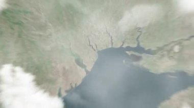 Dünya, Ulusal Akademik Opera ve Bale Tiyatrosu 'nda uzaydan Odesa, Ukrayna' ya yakınlaşır. Arkasından bulutlar ve atmosferden uzaya zum geliyor. Uydu görüntüsü. Seyahat girişi