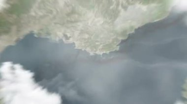 Dünya uzaydan Toulon, Fransa 'ya yakınlaşacak. Arkasından bulutlar ve atmosferden uzaya zum geliyor. Uydu görüntüsü. Seyahat girişi