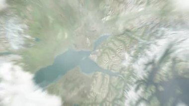 Dünya, Town Square Park 'ta uzaydan Anchorage, ABD' ye yakınlaşacak. Arkasından bulutlar ve atmosferden uzaya zum geliyor. Uydu görüntüsü. Seyahat girişi