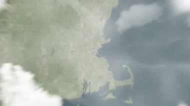 Dünya uzaydan Boston, ABD 'ye yakınlaşır. Arkasından bulutlar ve atmosferden uzaya zum geliyor. Uydu görüntüsü. Seyahat girişi