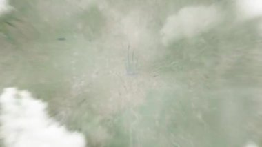 Dünya, Capitol Meydanı 'ndaki Columbus, ABD' ye uzaydan yakınlaştırıyor. Arkasından bulutlar ve atmosferden uzaya zum geliyor. Uydu görüntüsü. Seyahat girişi