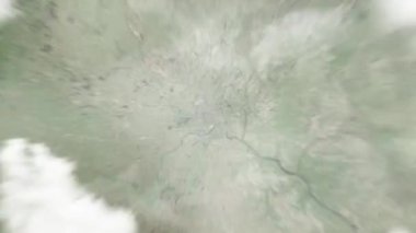 Dünya, uzaydan Minneapolis 'e, ABD' nin Belediye Binası 'na yakınlaşacak. Arkasından bulutlar ve atmosferden uzaya zum geliyor. Uydu görüntüsü. Seyahat girişi