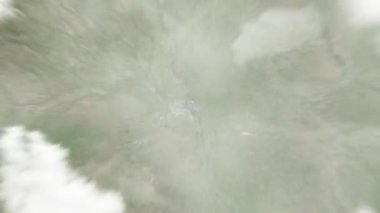 Dünya, Douglas Bölge Mahkemesi 'nde uzaydan Omaha, ABD' ye yakınlaşacak. Arkasından bulutlar ve atmosferden uzaya zum geliyor. Uydu görüntüsü. Seyahat girişi