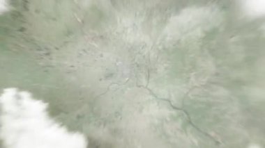 Dünya, Minnesota Eyalet Meclisi 'ndeki Saint Paul, ABD' ye uzaydan yakınlaşır. Arkasından bulutlar ve atmosferden uzaya zum geliyor. Uydu görüntüsü. Seyahat girişi