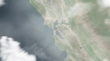Dünya uzaydan San Francisco 'ya, ABD' nin Belediye Binası 'na yakınlaşacak. Arkasından bulutlar ve atmosferden uzaya zum geliyor. Uydu görüntüsü. Seyahat girişi