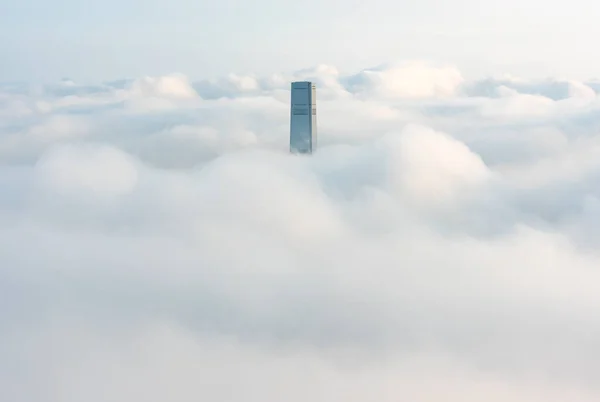 Skyscraper in Hong Kong  city shrouded in fog