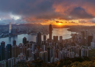 Sunrise over Victoria harbor in Hong Kong city