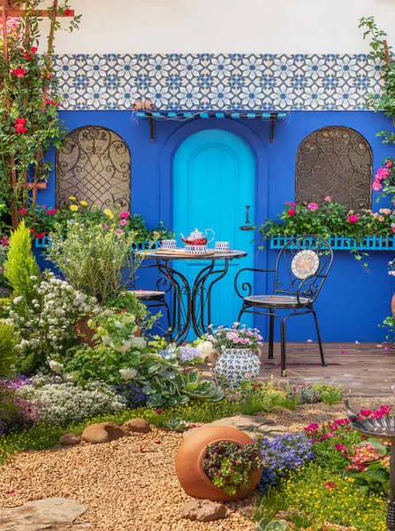 view of beautiful backyard flower garden of a Mediterranean style house
