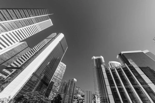 Tilt view of high rise office building in Hong Kong city