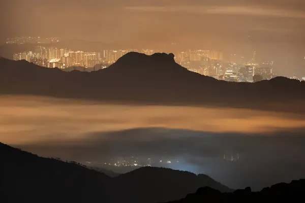 Idyllic landscape of silhouette of natural landmark mountain Lion Rock in Hong Kong