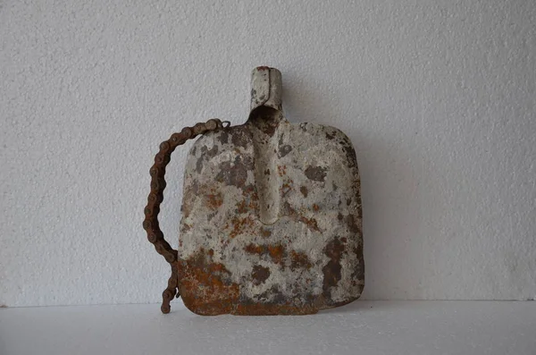 old rusty iron with a white background
