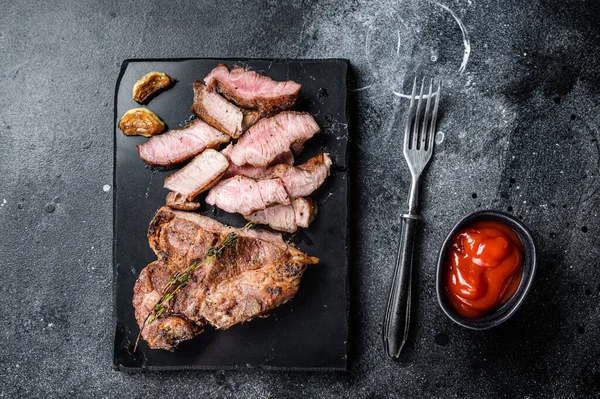 Grilled Sliced Pork Loin Steak Marble Board Black Background Top — Stok fotoğraf