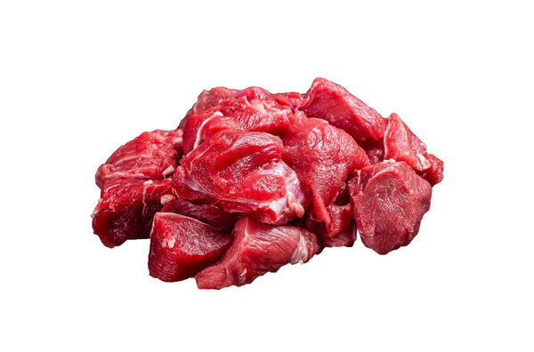 Raw diced red beef meat for Goulash on marble board. Isolated on white background.