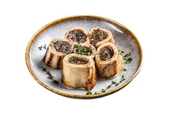 stock image Baked marrow veal beef bones in plate with thyme and herbs. Isolated on white background