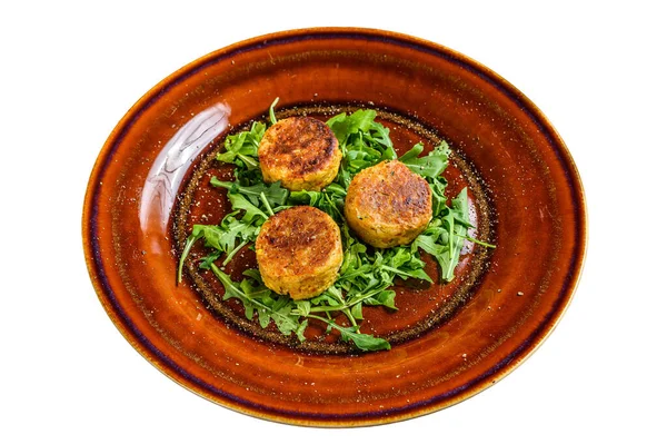 stock image Roasted chickpeas falafel patties with arugula on a plate. Isolated on white background