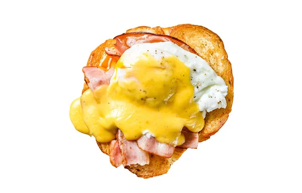 Breakfast Burger with bacon, egg Benedict, hollandaise sauce on brioche bun. Garnish with arugula salad. Isolated on white background