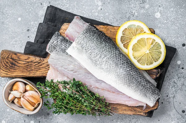 Fresh Raw Sea Bass Fillets Branzino Fish Thyme Lemon Gray — Stock Photo, Image