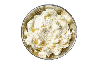 Kaymak Clotted cream, butter cream in a rustic pan. Isolated, white background. Top view clipart
