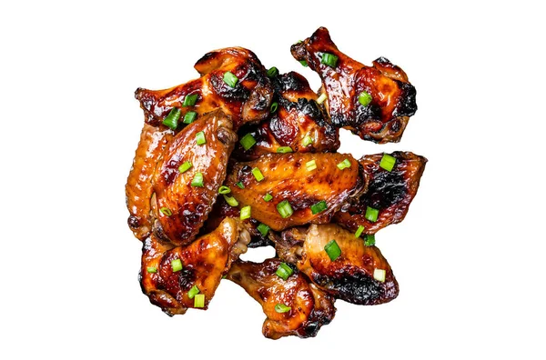 Baked chicken wings with sweet chili sauce in a plate. Isolated, white background