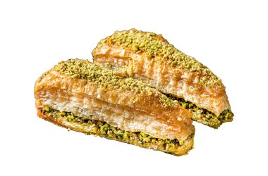 Türk, şam fıstığı ve balla Havuc Dilim Baklava 'yı keyiflendiriyor. İzole, beyaz arkaplan